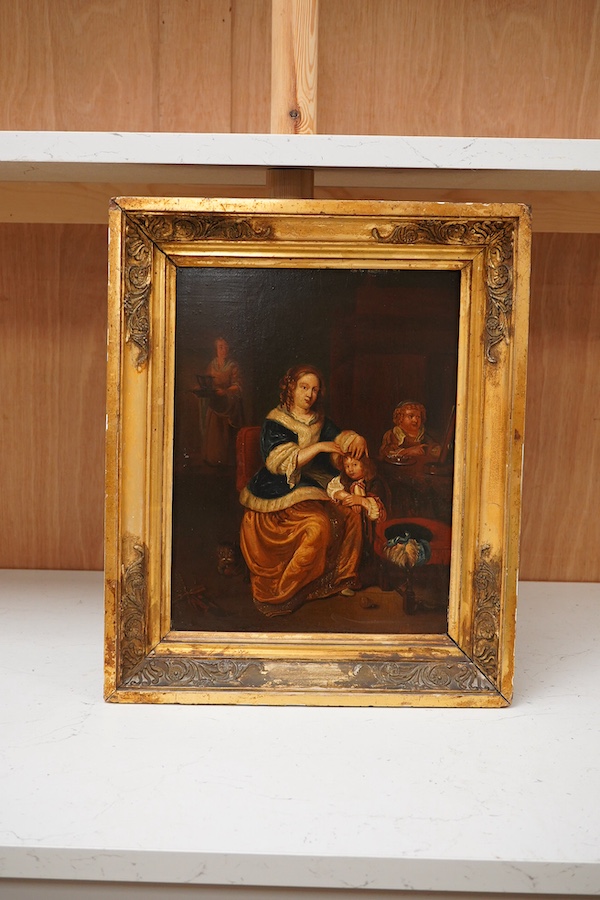 After Casper Netschel (Dutch, 1639-1684), 'Maternal Care', indistinctly signed lower right, chalk marks verso, oil on panel, 31 x 24cm, gilt frame